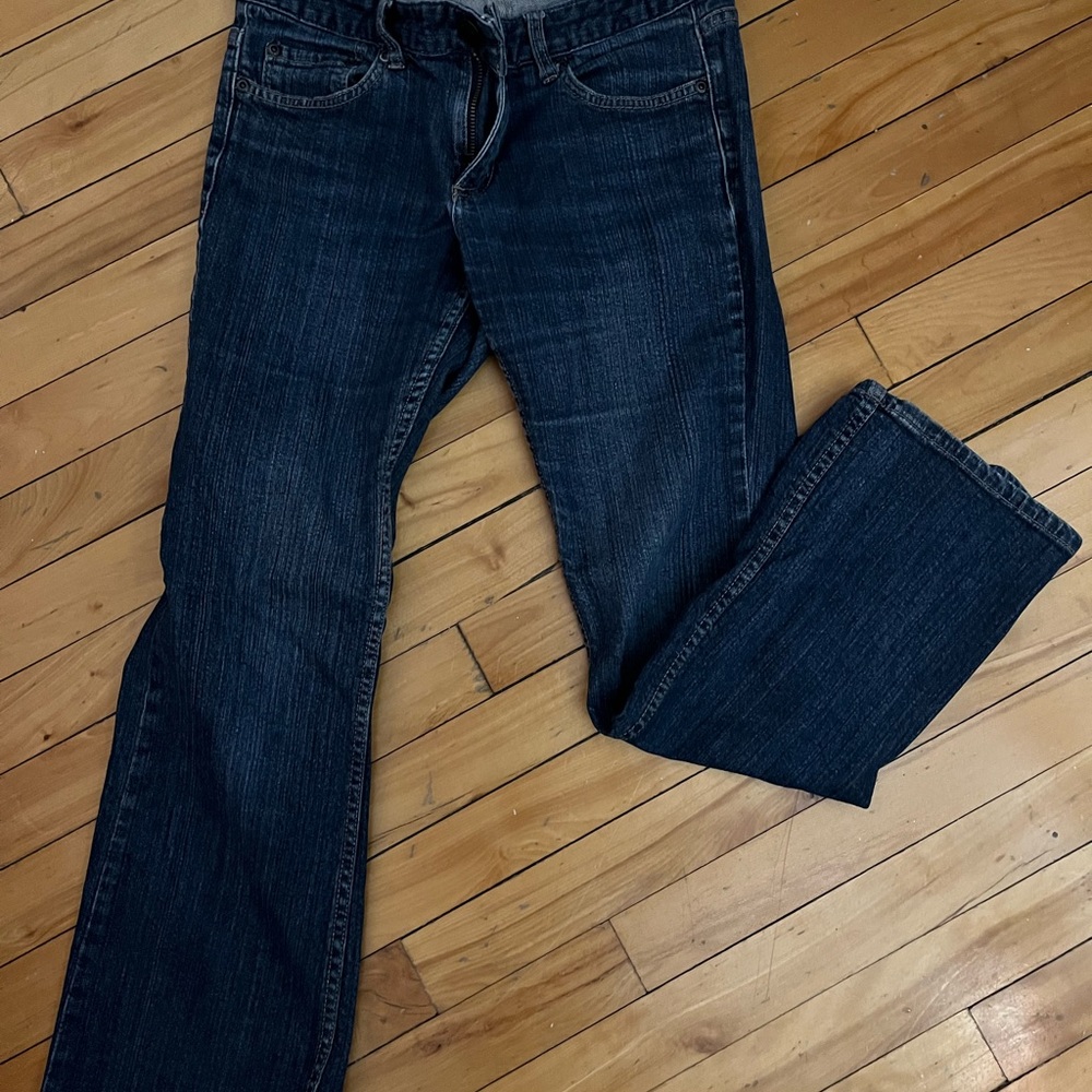 Low waisted dark washed flared jeans